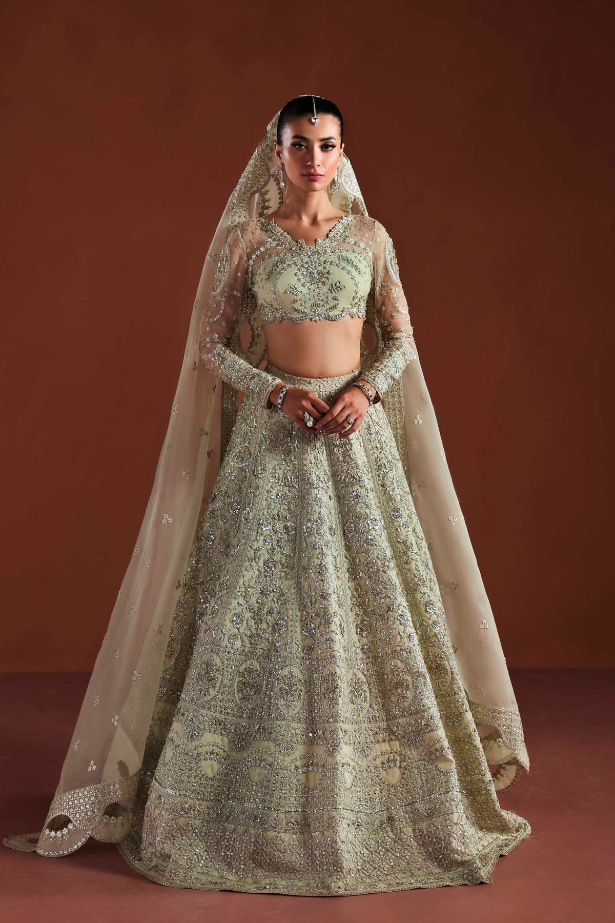 Traditional outfit with a floral design on a brown background