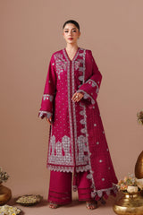 Woman wearing a red embroidered traditional outfit on a beige background